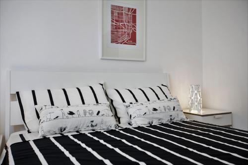 Posteľ alebo postele v izbe v ubytovaní GIULIA E CHIARA LUXURY APARTMENT