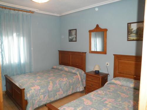 Postel nebo postele na pokoji v ubytování Apartamento Casa Geli #1
