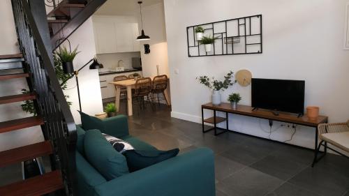 TV a/nebo společenská místnost v ubytování Bartholomeu GuestHouse 2
