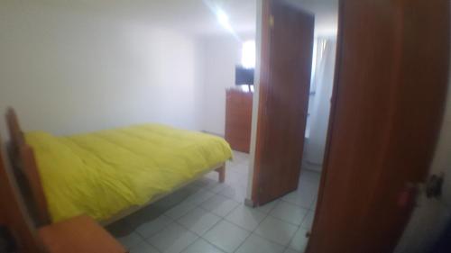 Ένα ή περισσότερα κρεβάτια σε δωμάτιο στο Hotel y Cabañas Rural Mirador del Maipo