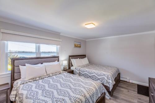 Ένα ή περισσότερα κρεβάτια σε δωμάτιο στο Colonial Shores Resort