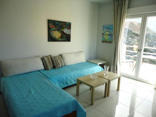 Ένα ή περισσότερα κρεβάτια σε δωμάτιο στο Alkyon View Luxury Μaisonette