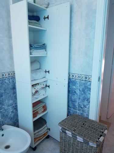 a bathroom with a toilet and a sink at Casa Horadada in Algorfa