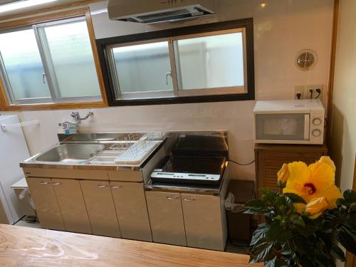 Dapur atau dapur kecil di Condominium WAFU TEI Okinawa city