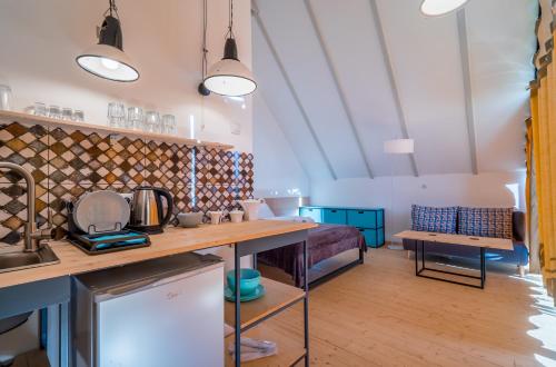 a kitchen with a sink and a counter top at Kazbegi View in Kazbegi