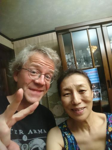 a man and a woman posing for a picture at Live Cafe Hisui no Umi in Itoigawa