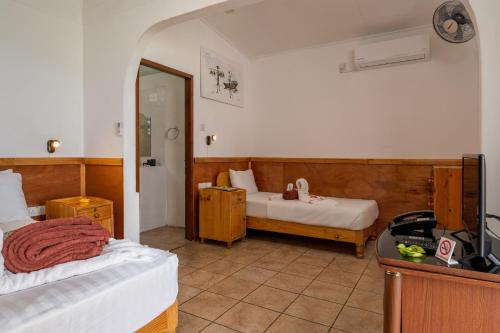 Postel nebo postele na pokoji v ubytování Beach Cove