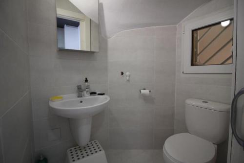 Ett badrum på Villa La Zenia Boulevard 36