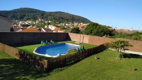Výhled na bazén z ubytování Hotel Rústico Prado da Viña nebo okolí