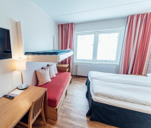 Кровать или кровати в номере Pernilla Wiberg Hotel