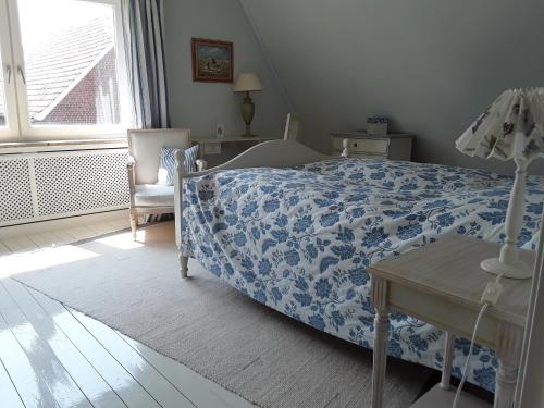 Cama ou camas em um quarto em Gästehaus am Alten Hafen