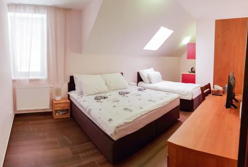 מיטה או מיטות בחדר ב-Apartment De Luna