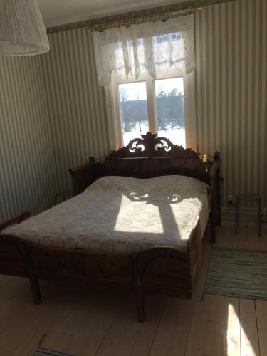 Postel nebo postele na pokoji v ubytování STF Tre Björnar B&B