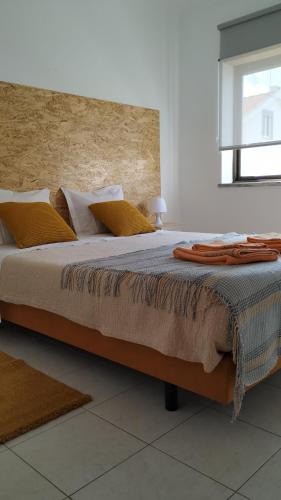 Postel nebo postele na pokoji v ubytování Sun House - Baleal