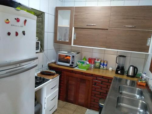 
A cozinha ou cozinha compacta de Pousada Santo Antônio

