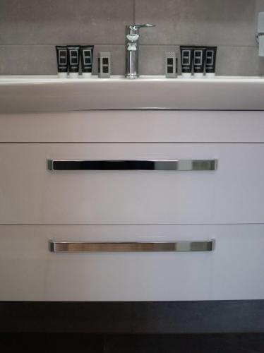 a bathroom drawer with a sink at Center Luxury Rooms 2 in Split