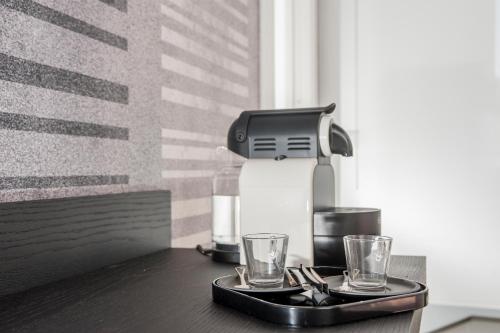 Příslušenství pro přípravu čaje a kávy v ubytování B&B First Floor