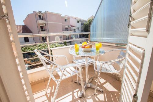 Un balcón o terraza de Adzic Apartments