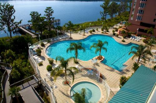 an overhead view of a swimming pool at a resort at Beautiful Apartment close to Disney, fully equipped Amazing lake views in Orlando