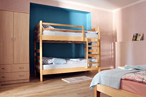 Postel nebo postele na pokoji v ubytování Kacharava apartments