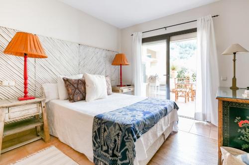 Cama o camas de una habitación en Chambao Suite Marbella Golf Rio Real