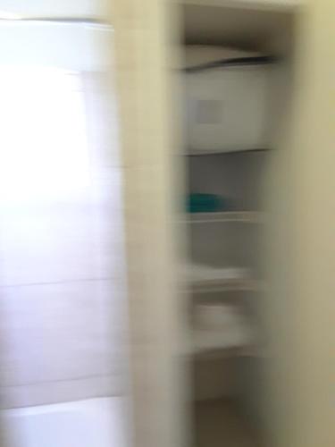a blurry picture of a shelf in a room at Barrianna Villa in Montego Bay