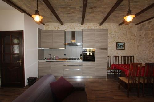 Kuchyň nebo kuchyňský kout v ubytování Casa rustica