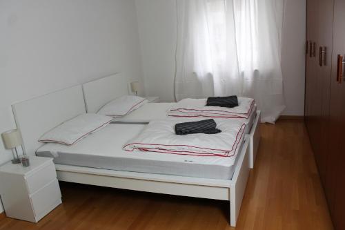 Letto o letti in una camera di Appartamento Trento Centro
