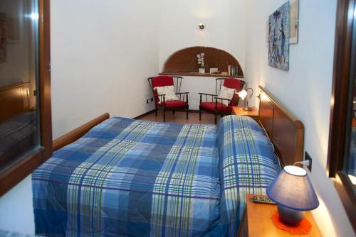 Posteľ alebo postele v izbe v ubytovaní emy lake orta