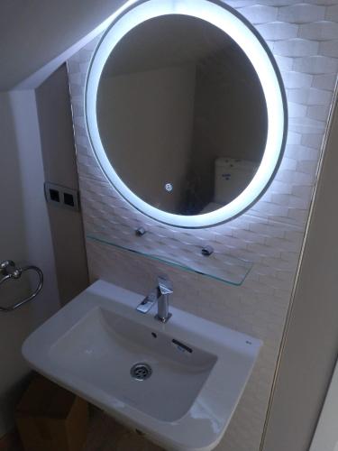 Ένα μπάνιο στο Travesia Rooms
