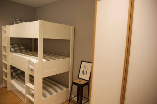 Posteľ alebo postele v izbe v ubytovaní Apartamento Donostia Chic