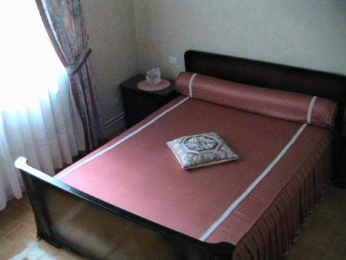 Ένα ή περισσότερα κρεβάτια σε δωμάτιο στο GITE CHEZ JEAN PAUL