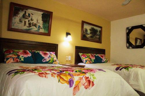 Hotel San Clementeにあるベッド
