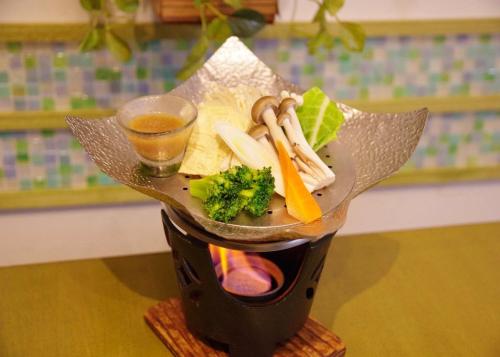 a plate of food on top of a blender at Mashikokan Satoyama Resort Hotel in Mashiko