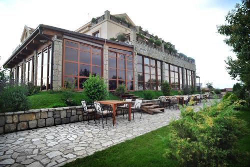 Vonkajšia záhrada v ubytovaní Hotel Aria