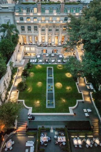 an aerial view of a building with a large lawn at Palacio Duhau - Park Hyatt Buenos Aires in Buenos Aires