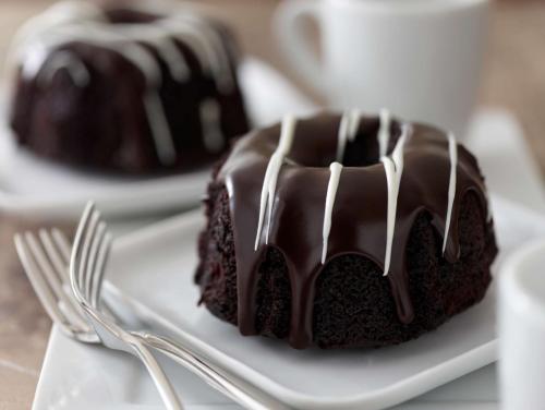 a chocolate bundt cake on a plate with a fork at Hyatt Place Virginia Beach Town Center in Virginia Beach