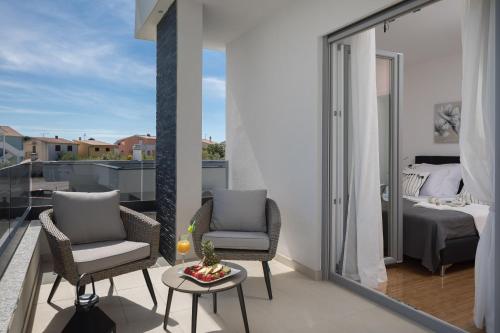 Ένα ή περισσότερα κρεβάτια σε δωμάτιο στο HOLIDAY HOME VENTUM