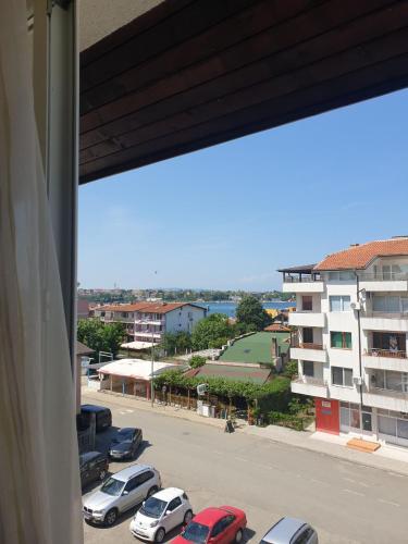 a view from a window of a parking lot at Hiora Apartments Vasiliko in Tsarevo