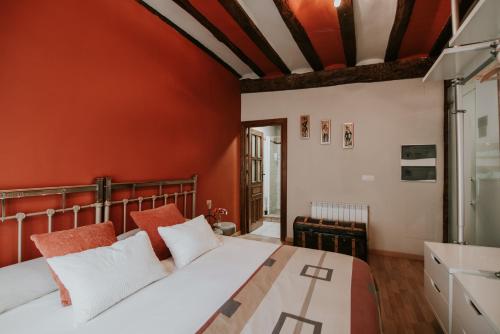 A bed or beds in a room at Haro Apartments