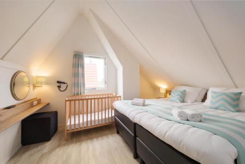 Giường trong phòng chung tại Center Parcs Zandvoort beach