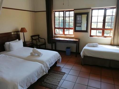 Katil atau katil-katil dalam bilik di The Woodsman Bed and Breakfast