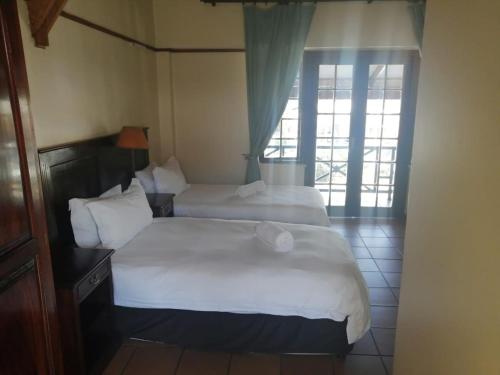 Katil atau katil-katil dalam bilik di The Woodsman Bed and Breakfast