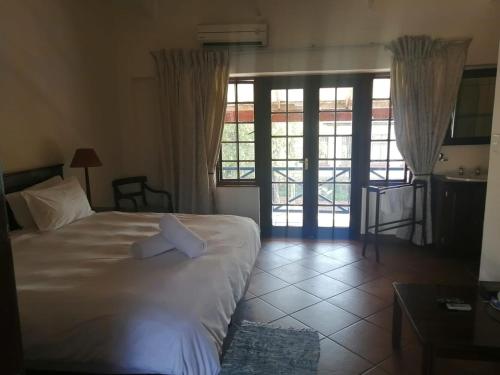 Katil atau katil-katil dalam bilik di The Woodsman Bed and Breakfast