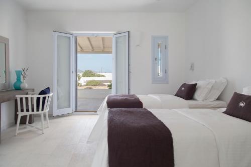 Katil atau katil-katil dalam bilik di The Sand Collection Villas