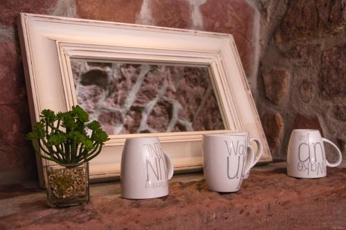 Příslušenství pro přípravu čaje a kávy v ubytování Hotel Villa Marstall