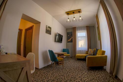 TV a/nebo společenská místnost v ubytování Residence Rooms Bucovina