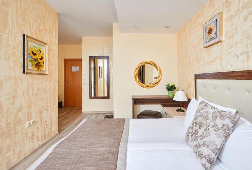 Кровать или кровати в номере Hotel Venus