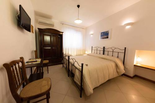 Postel nebo postele na pokoji v ubytování B&B La Stradella