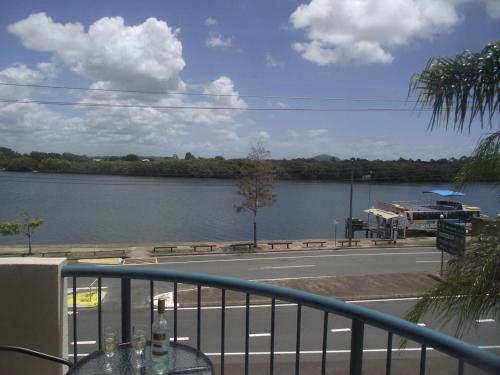 a view from the balcony of a boat on the water at River Sands Apartments in Maroochydore